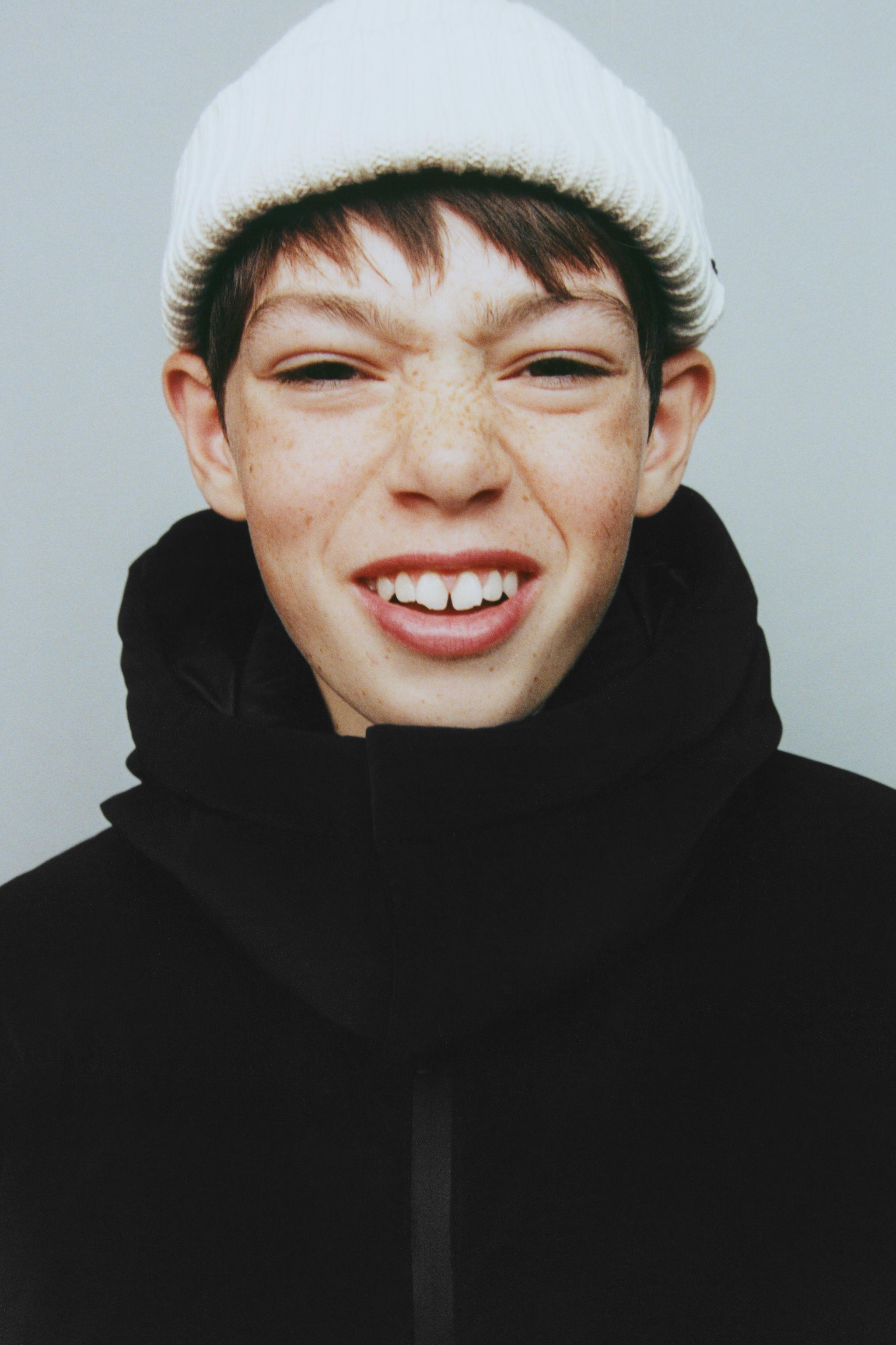 LONG QUILTED COAT WITH LABEL